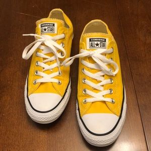 Yellow Converse All Stars.